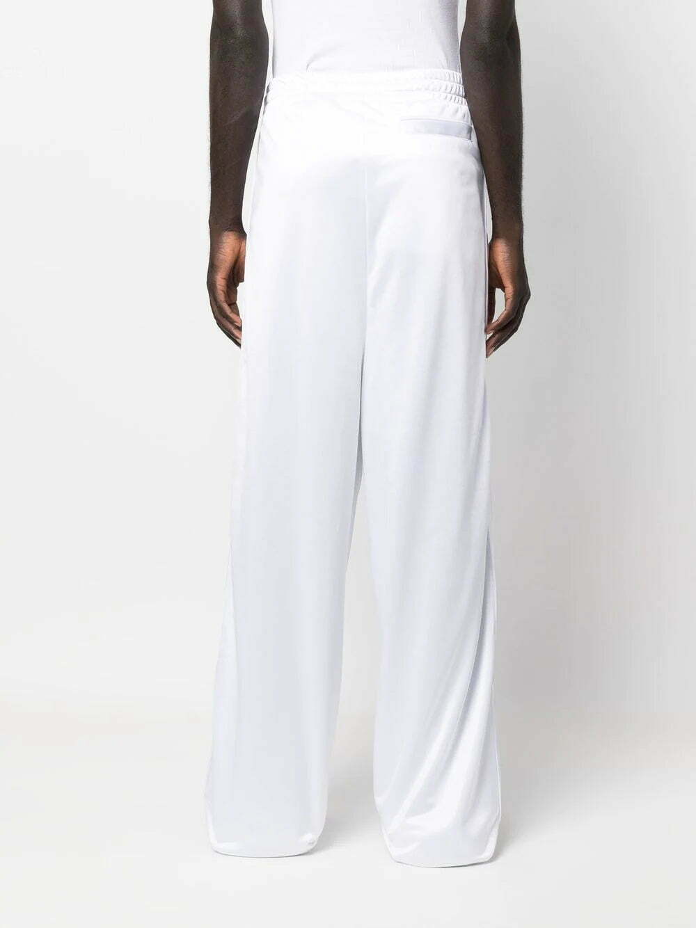 VETEMENTS logo-patch track pants - Image 4