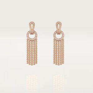 Cartier Agrafe earrings, half-paved