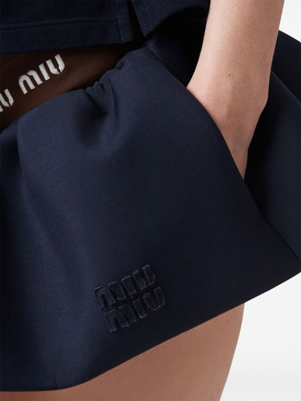 Miu Miu logo-appliqué wool miniskirt - Image 4